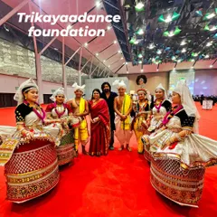 My troupe of Manipuri dancers posing with a dignitary after a performance. We choreograph and present a wide variety of Indian classical dance forms.