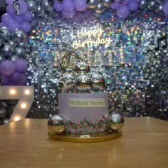 Even the cake was on theme! This gorgeous disco-themed cake with silver disco balls was the perfect centerpiece for the dessert table at Mahati's 7th birthday.