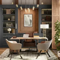This classic home office design features dark, built-in cabinetry and bookshelves that create a distinguished, library-like feel. We paired it with a simple, elegant desk and comfortable chairs to create a perfect environment for focus and productivity.