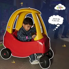 Catch me if you can! This little driver is on the move in our toddler play zone, enjoying the freedom to explore in a classic kid-powered car.