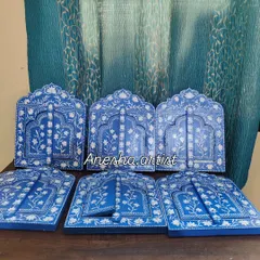A full set of my blue Jharokha frames, available in different sizes and designs. They can be arranged together to create a stunning gallery wall with a traditional Indian touch.