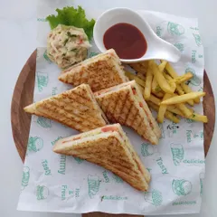 A simple classic done right. Our grilled club sandwiches are cut into quarters and served with french fries and coleslaw, making for a satisfying and familiar option for casual events or kids' parties.