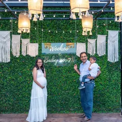 A happy family portrait at a chic, modern baby shower. We capture the excitement of parents-to-be and their loved ones as they celebrate the upcoming arrival.