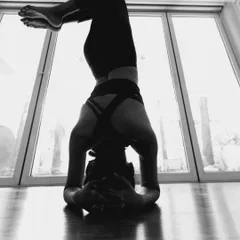 A powerful silhouette of a headstand, a preview for my Core & Inversions workshop. Turning upside down builds confidence and strength.