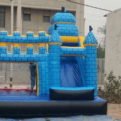 A classic blue inflatable castle with a jumping area and an internal slide. This simple, timeless design is always a popular choice.
