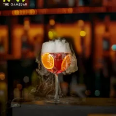 Our cocktails are as dramatic as our weekend plans. This smoky, citrus-infused creation is just a preview of the magic our bartenders mix up every night.