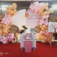 A sweet teddy bear-themed baby shower in pastel pink and peach. The 'Boy or Girl?' sign adds a fun element of surprise to the celebration.
