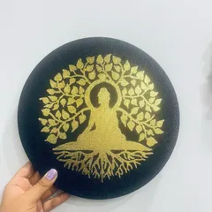 A piece for quiet contemplation. This custom artwork features Buddha meditating under the Bodhi tree, painted with shimmering gold acrylic on a round black canvas. It’s designed to be a focal point of peace and serenity in any room.
