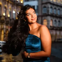This portrait was shot at night in Mumbai, using the blurred lights of the city to create a dreamy backdrop. The goal was to capture a portrait that shines, even in low light conditions.