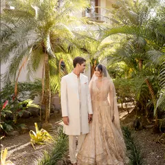 An ivory dream for a seaside scene in Costa Rica. We styled the couple in matching ivory ensembles from Tarun Tahiliani and Lalit Laungani that exuded serene elegance for their beach wedding.