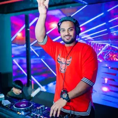 I decide my vibe. Here I am, ready to rock the party, bringing a positive and high-energy attitude to the DJ booth.