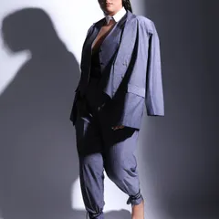 This full-length shot from the Sakshi Sindwani feature highlights the complete outfit, from the tailored suit to the strappy heels. It's all about creating a cohesive and impactful image.