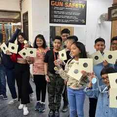The smiles say it all. I love hosting events for kids, like this Children's Day celebration. Seeing them proudly show off their targets and medals after a safe and supervised shooting session is the best part of my job. It's a great option for a unique birthday party.