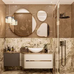Flush with finesse. This bathroom design uses a rich brown marble, a custom vanity with a curved design, and a set of organic-shaped mirrors to create a warm, earthy, and luxurious space.
