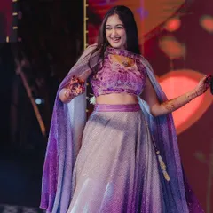 Capturing the pure joy of a Sangeeth night. For Surabhi's performance, I created a radiant look with shimmering eyes and a hairstyle that's both elegant and secure, ensuring she could dance the night away without a worry.