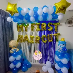 Celebrate a special milestone with a "My First Haircut" party. We created this fun blue and white balloon backdrop to make the occasion memorable.