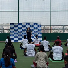 Addressing the group at Withum against the backdrop of the Bengaluru skyline. My goal is to create an inclusive environment where every employee feels comfortable and guided.