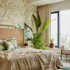 A beautiful bedroom featuring a custom spring garden mural. The soft colors and botanical elements create a serene and refreshing atmosphere, making the wall a stunning focal point.