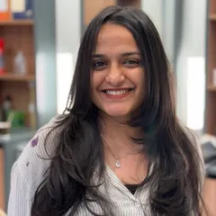 A happy client showing off her new layered haircut. The layers add so much volume and movement to her long hair.