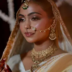 A close-up of this beautiful South Indian bridal look. The skin is perfected but not heavy, and the eye makeup is blended to create a soft, sultry effect.