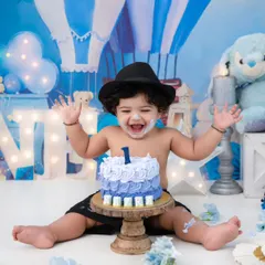 Let the fun begin! A first birthday cake smash is a celebration of pure, uninhibited joy. I love capturing the delightful mess and the priceless expressions as they explore their first taste of cake.