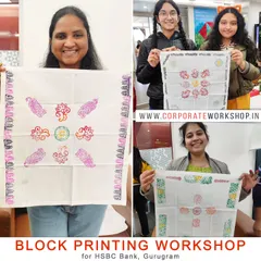 Happy participants showing off their custom-designed, hand-printed handkerchiefs. A perfect takeaway from a fun and creative workshop.