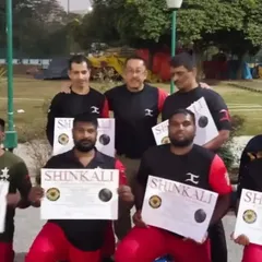 My students proudly displaying their SHINKALI promotion certificates after training with Sensei E. Grading is an important part of the martial arts journey.
