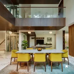 The open layout of Kanasu connects the dining, living, and mezzanine levels, creating a cohesive and social environment for the family.