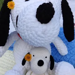 Big Snoopy, meet little Snoopy. I made the jumbo plushie with extra-squishy Blankie yarn for maximum huggability, and his mini-me is perfect as a desk buddy. Seeing them together shows the different sizes I can create for any custom character you have in mind.