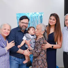 There is nothing more precious than the bond between generations. We quietly capture these tender moments, like a great-grandmother's kiss, creating timeless family portraits that tell a story of love through the years.