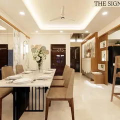 The dining area is designed for memorable meals, featuring an eight-seater marble top table and a convenient breakfast counter with bar stools for casual dining.