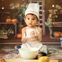 Let's get creative and messy! Our 'Little Master Chef' themed photoshoot is perfect for capturing your child's playful personality, complete with a chef's hat, apron, and a whole lot of flour.
