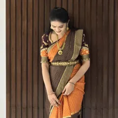 A candid moment of our client looking graceful in her Dhavala saree. It's wonderful to see my creations become a part of your special moments.
