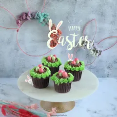 My Easter cupcakes are topped with chocolate frosting "grass" and mini candy eggs. They are a festive and delicious treat for celebrating the arrival of spring.