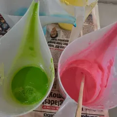 The very first step in making my ice cream soaps. I melt premium, skin-loving soap bases and mix in vibrant, skin-safe colors to create the different "flavors."
