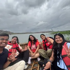 Enjoying a traditional coracle ride on the Tungabhadra river in Hampi. This is a must-do activity that offers a unique perspective of the ruins.