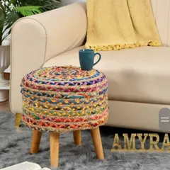 A vibrant, multi-colored jute stool that adds a playful and eclectic touch to your decor. Each piece is unique and full of character.