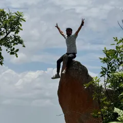 That feeling of being on top of the world. A triumphant moment for a trekker at the summit of Uttari Betta.