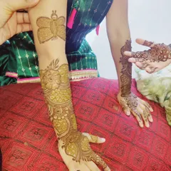 A fun and unique design for a young client. She wanted a butterfly on her arm along with a more traditional pattern on her hand, and I was happy to create this custom look for her.