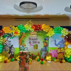 Our jungle theme birthday parties are a huge hit with kids. We create a complete environment with a large themed backdrop, colorful balloon arches, and character cutouts like zebras, lions, and giraffes to bring the safari to your party.