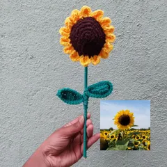 A single, stunning crochet sunflower, inspired by the real thing. It's perfect as a single stem in a vase or as part of a larger bouquet.