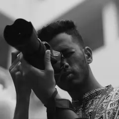 A close-up shot of me looking through the viewfinder. Photography is my passion, and I put all my focus and energy into capturing the perfect moment.