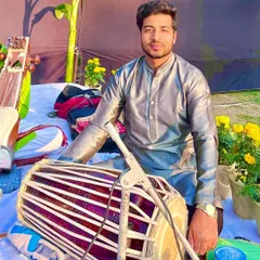 Here I am with my pakhavaj, an ancient and powerful percussion instrument. Its deep, resonant sound is perfect for traditional dhrupad compositions and devotional music, and I am grateful to carry its legacy forward.