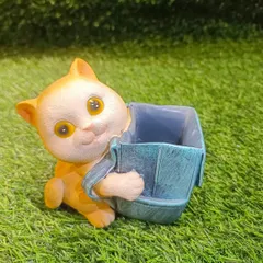 A charming cat pen holder that's perfect for cat lovers. This little figurine holds your pens in its backpack, making it a fun and functional desk accessory.
