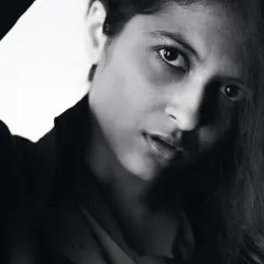 A quiet moment from an intimate boudoir session. I believe in showing a vulnerable, unfiltered side, and this monochrome portrait captures that raw emotion and artistic simplicity.