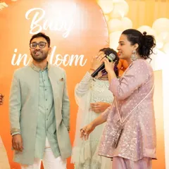 Capturing a funny, shy moment from a guest during a baby shower game. My interactive style ensures everyone feels involved and has a good laugh.