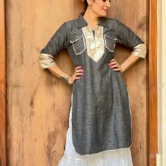 Here I am modeling for a designer label, with makeup and hair I did myself. The look is simple and elegant, featuring a clean base, defined eyes, and a tidy updo to complement the ethnic wear.