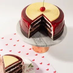 It's all about that perfect slice. This cake features a glossy mirror glaze and rich, decadent layers inside. I believe a cake must taste even better than it looks, and this one definitely delivers.