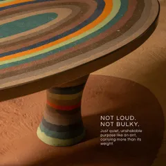 We believe furniture should be functional art. Inspired by the quiet strength of an ant, this terrazzo table combines a sculptural form with a richly textured, multi-colored surface, creating a piece that grounds the room with its unique presence.