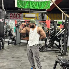 Another angle of the bicep flex. It's important to know your best angles to present your physique effectively.